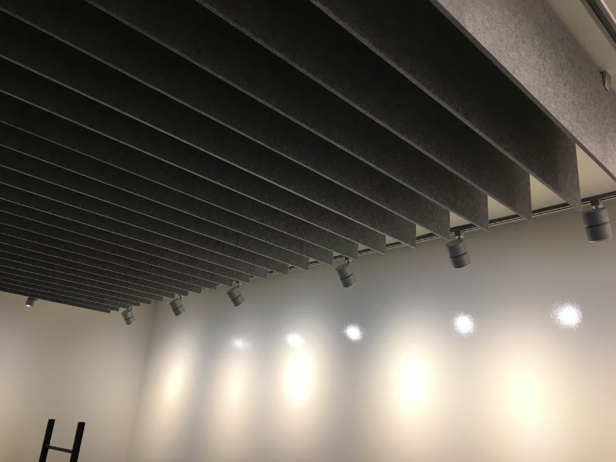 ezoBord -  Geo Tiles used on Wall and Ceiling - Ezobord Blades to boardroom ceiling finished